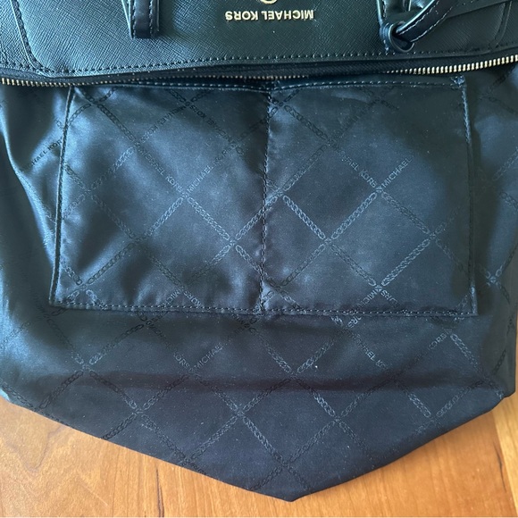 Michael Kors black bag w/2 outside pockets & spacious interior: 10” x 14” - Picture 8 of 9